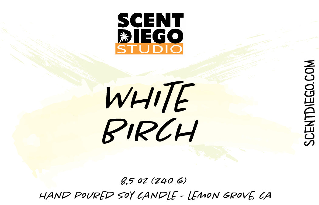 Label of a candle with the name 'WHITE BIRCH' prominently displayed, against a background that mimics a birch tree bark texture. The brand 'SCENT DIEGO STUDIO' is mentioned at the top.